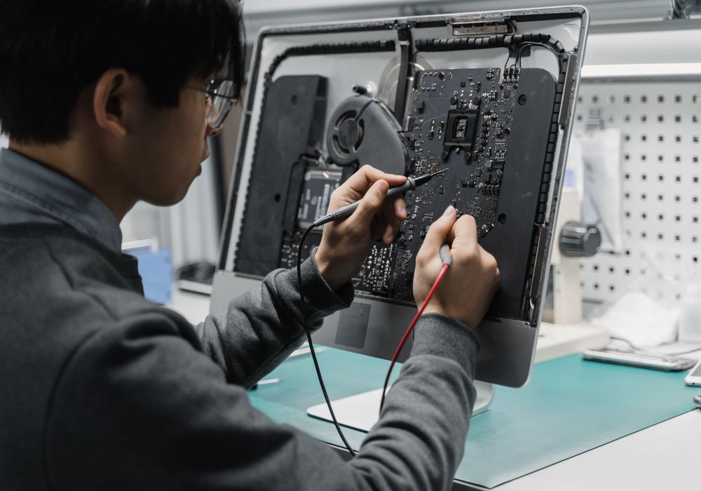 Chama Solution service workshop — technician at work
