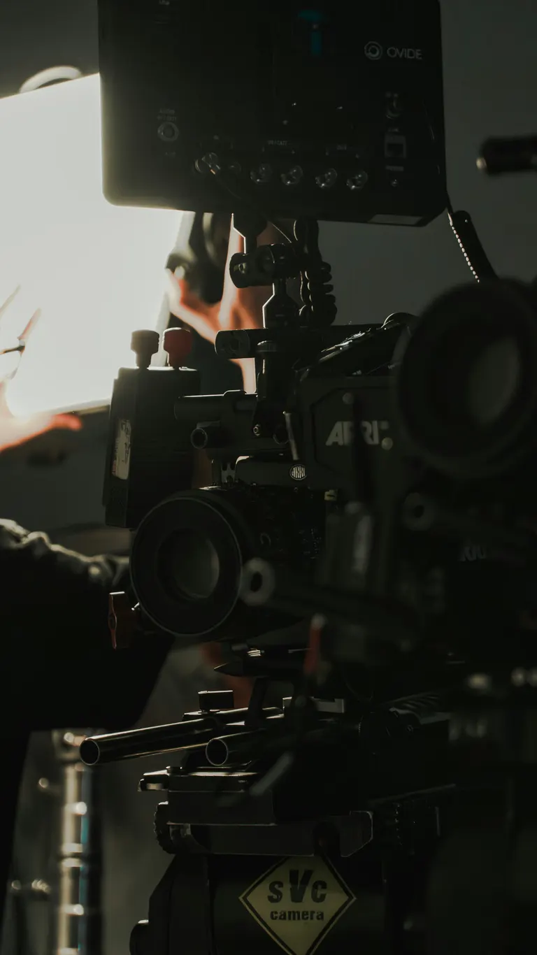 Professional cinema camera on a tripod in a studio — photography services by Chama Solution